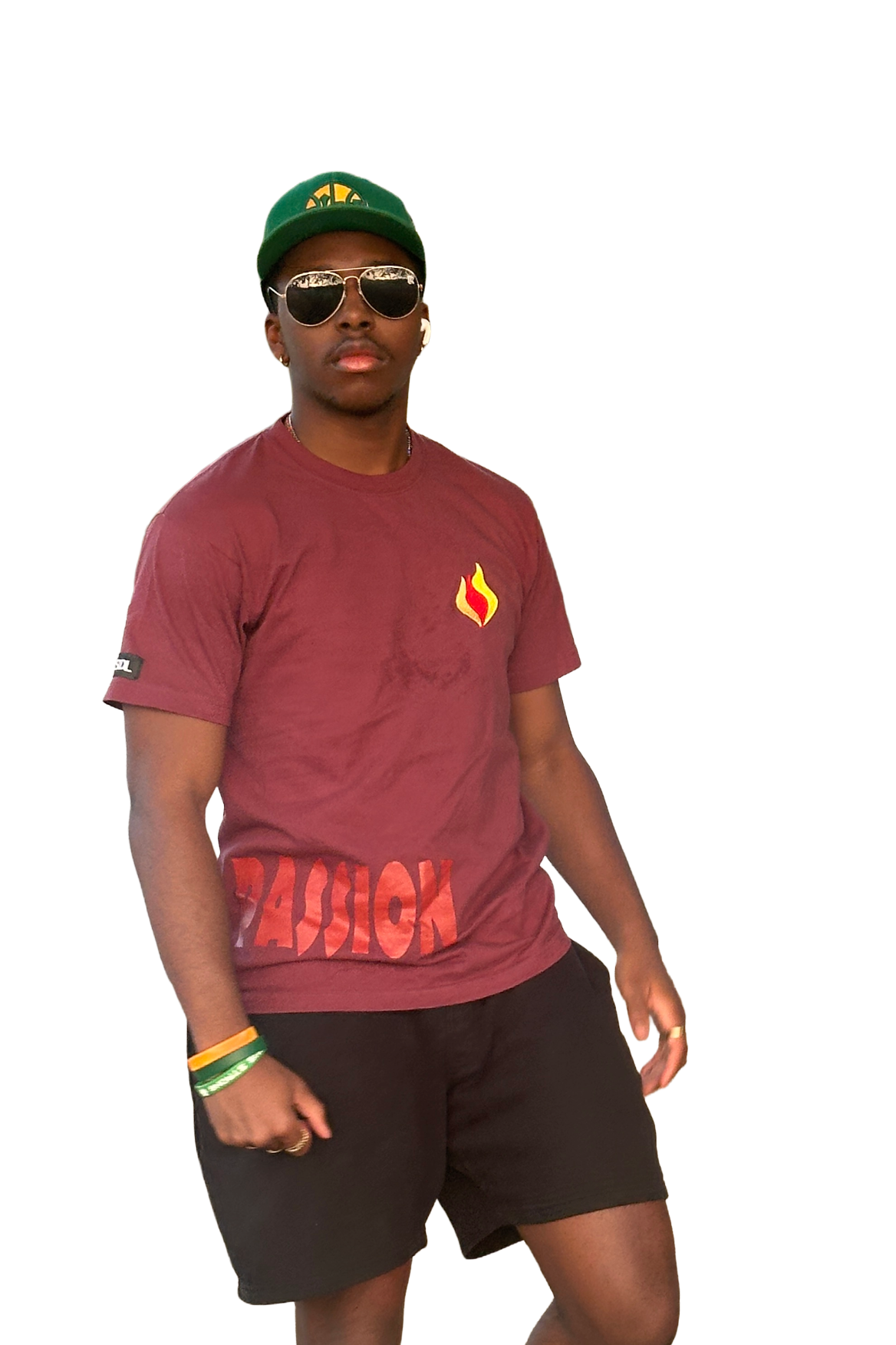Person wearing a maroon t-shirt with red text and black shorts on a white background